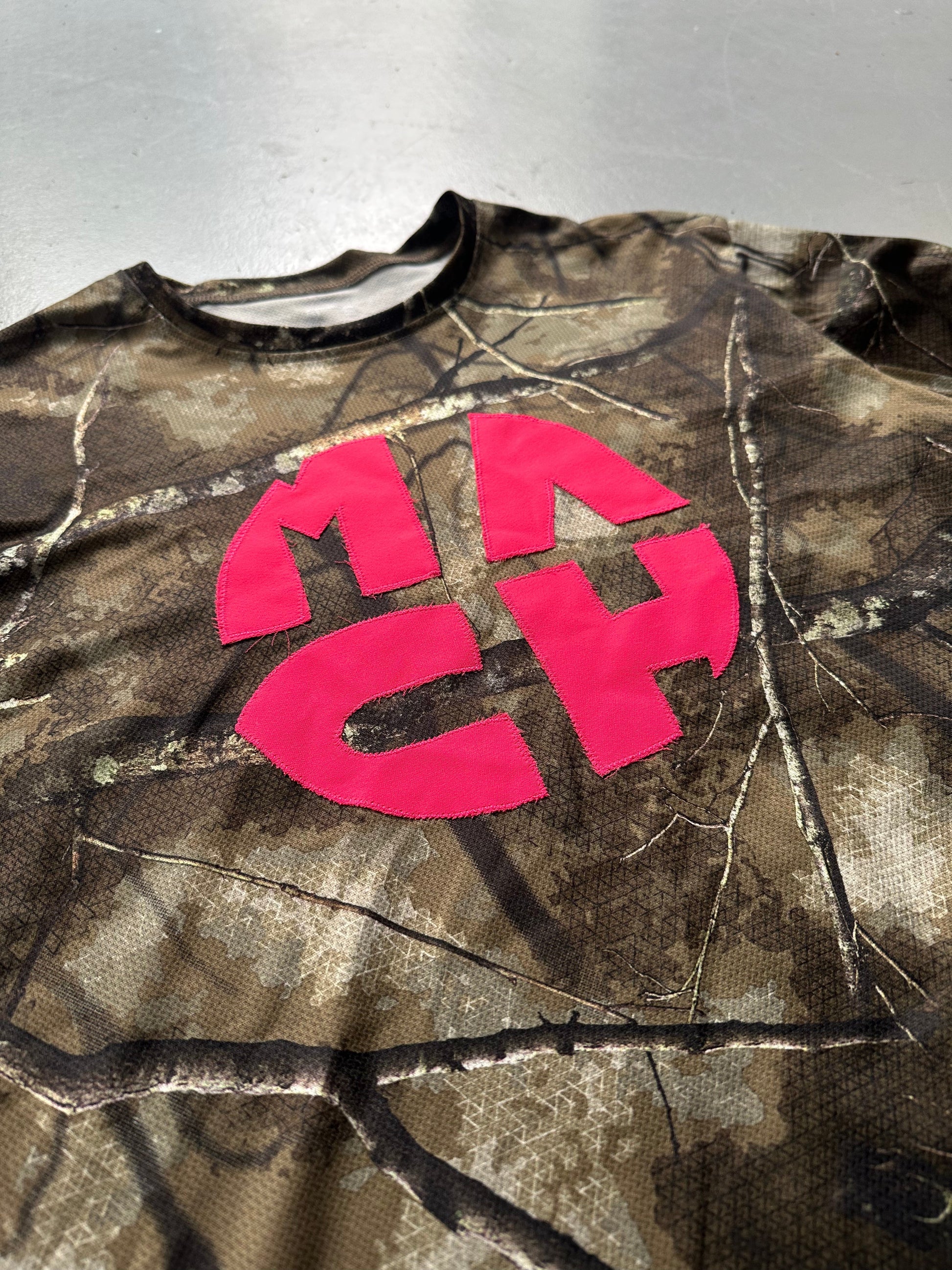 Mach Designs Real Tree Camo Iconic Pink Logo Long Sleeve Green